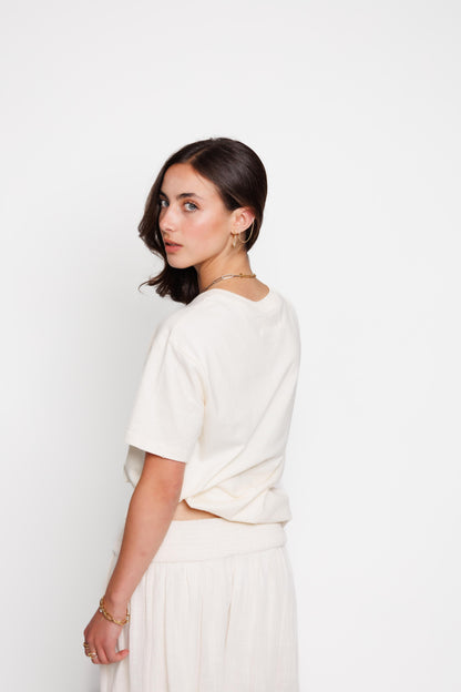 PLAYERA CREMA CRESTED